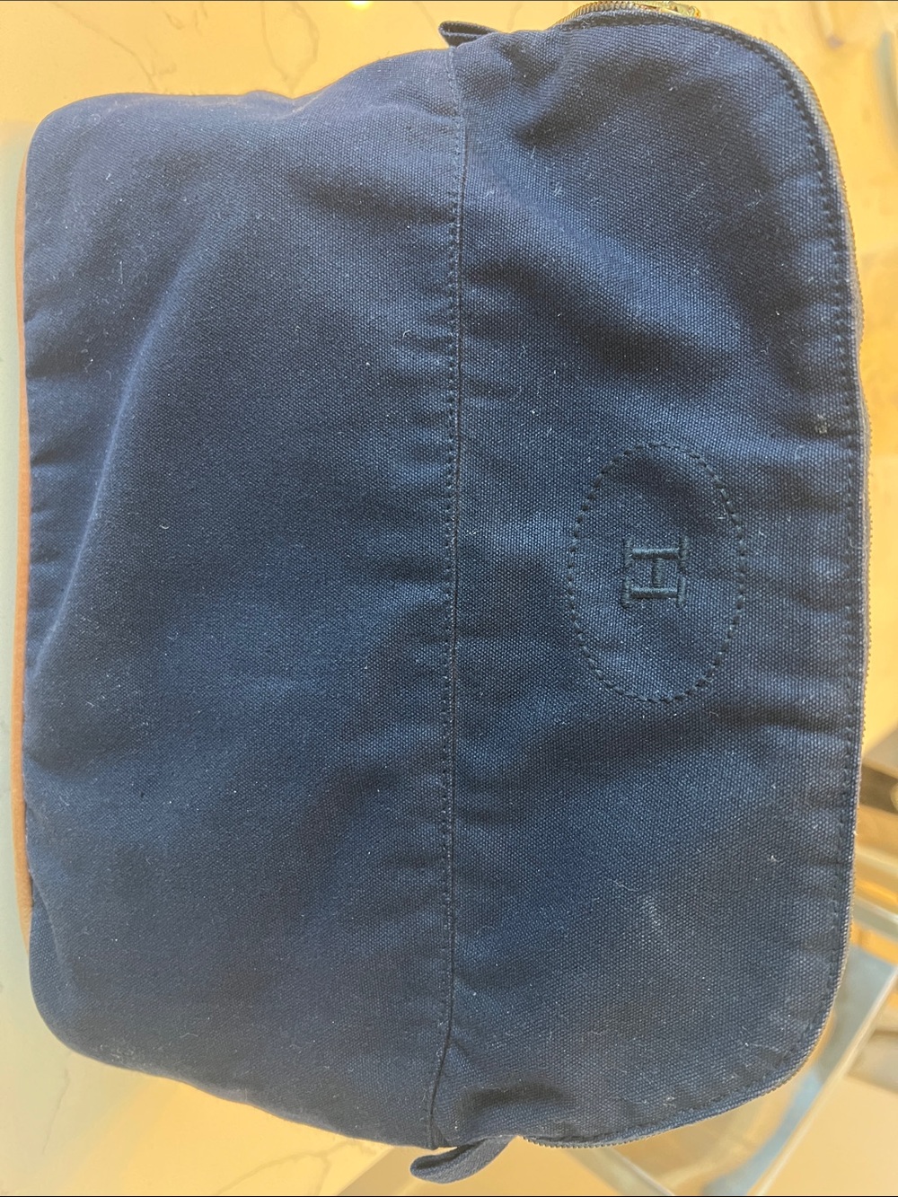 Navy Canvas Crossbody Bag with Embossed 'H' Logo
Hermes toiletries bag